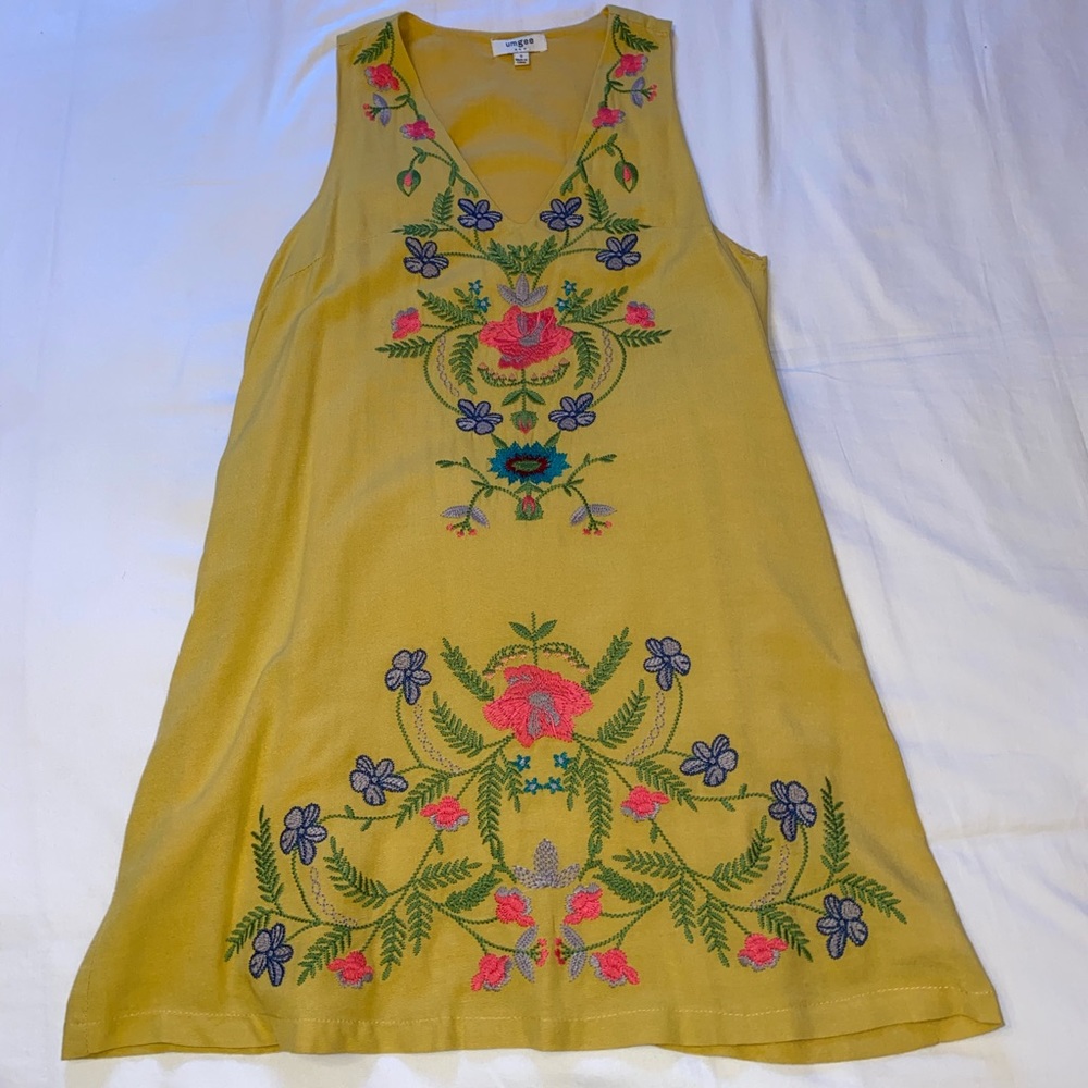 Gold dress with colorful embroidery